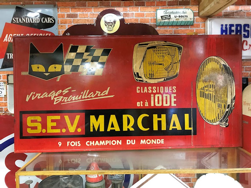 Marchal painted tin sign in original wooden frame