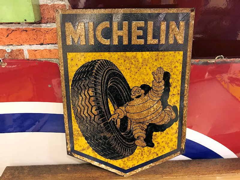 Small embossed tin Michelin shield shaped sign