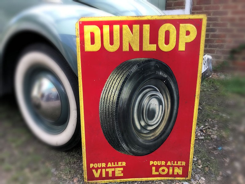 Embossed tin Dunlop sign