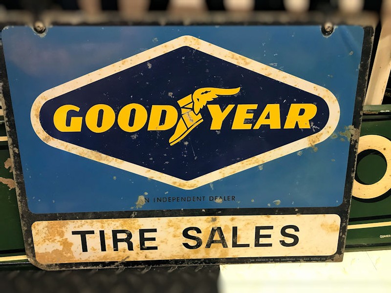 Original double sided tin Good Year Tire Sales sign and bracket