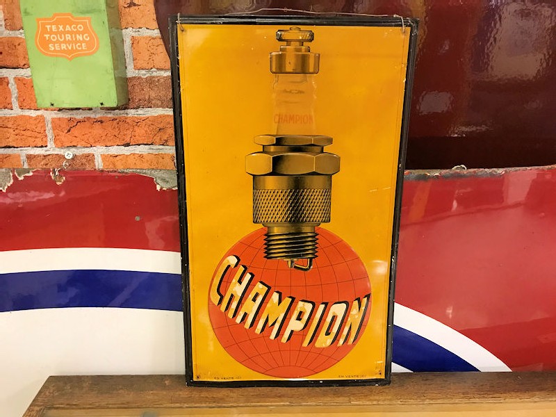 1930s Champion Spark Plug embossed tin sign