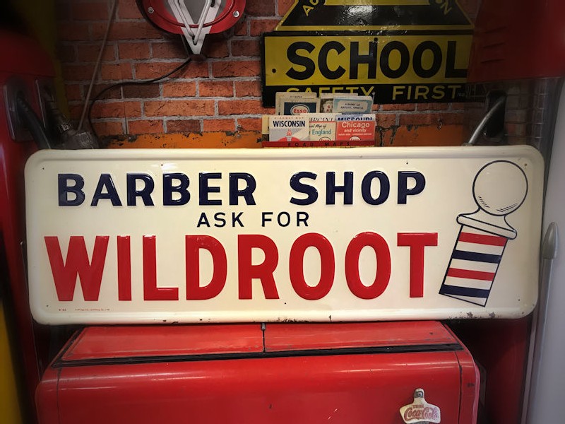 1956 wildroot hair tonic embossed tin barber shop sign
