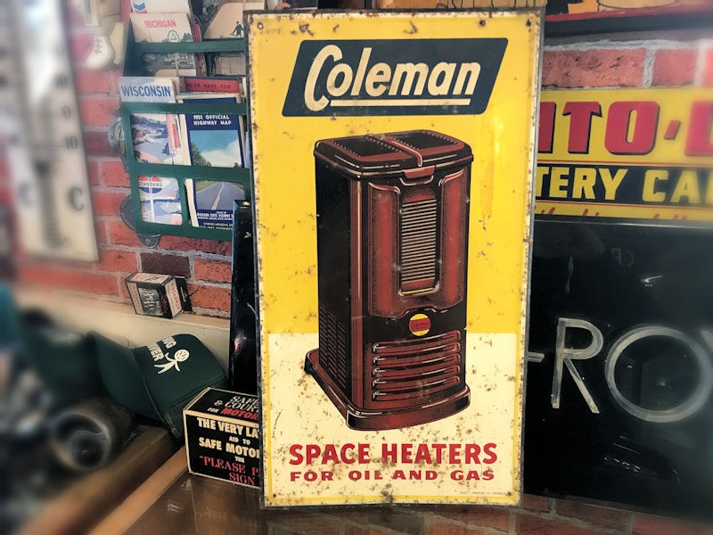 Printed tin Coleman space heaters sign