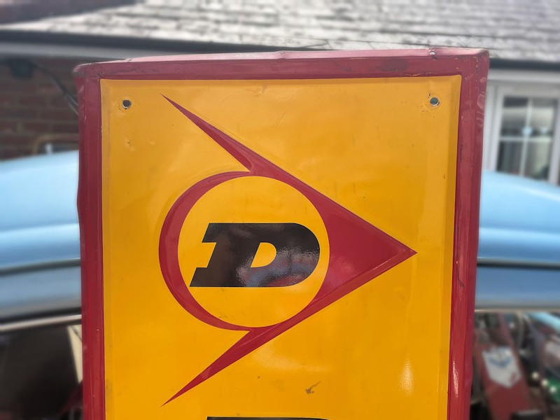 Original embossed tin Dunlop tire sign