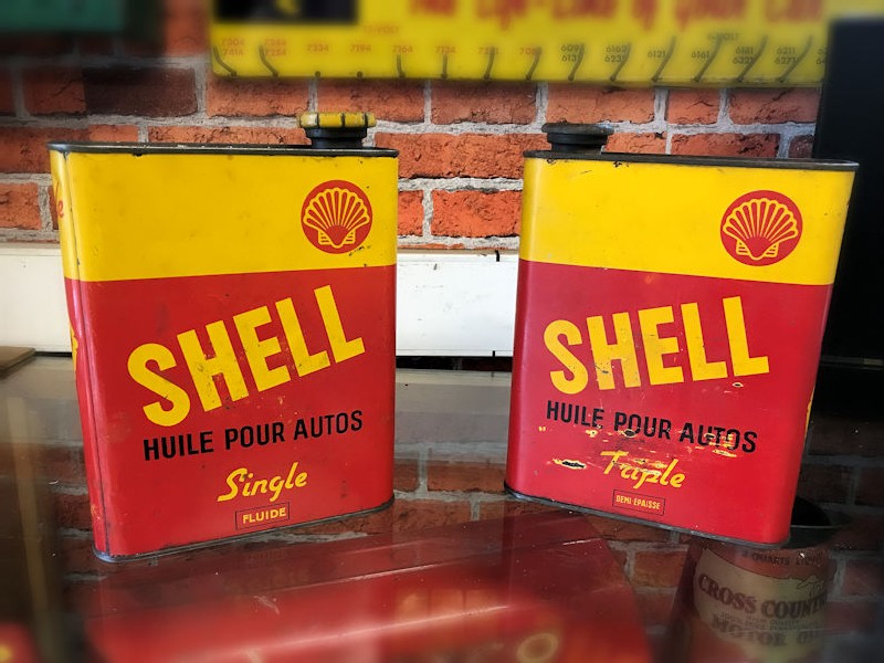 Rare Shell robot stick man Shell tin oil cans