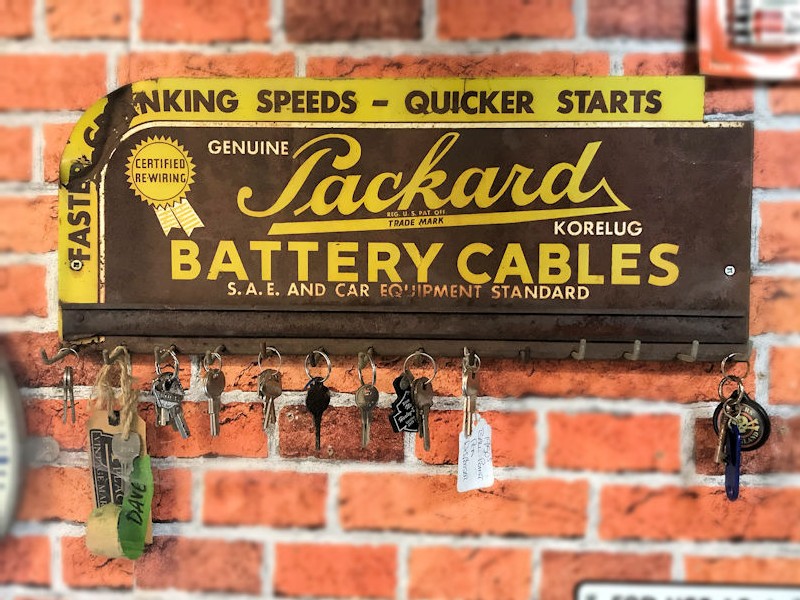 Original Packard battery painted tin cables rack