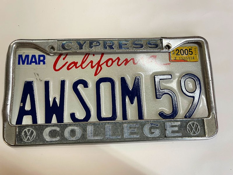Original vintage Volkswagen Cypress College license plate surround