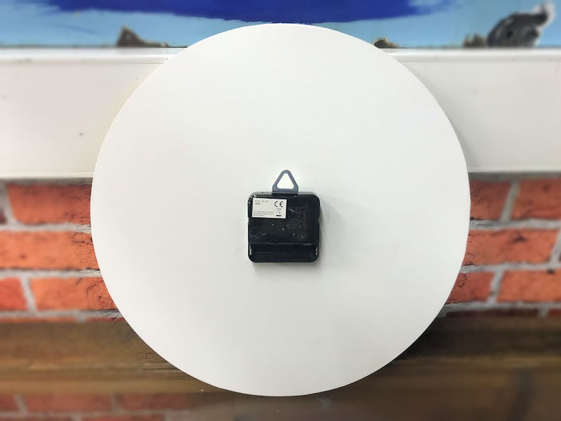 Plastic round Bosch spark plug battery operated clock