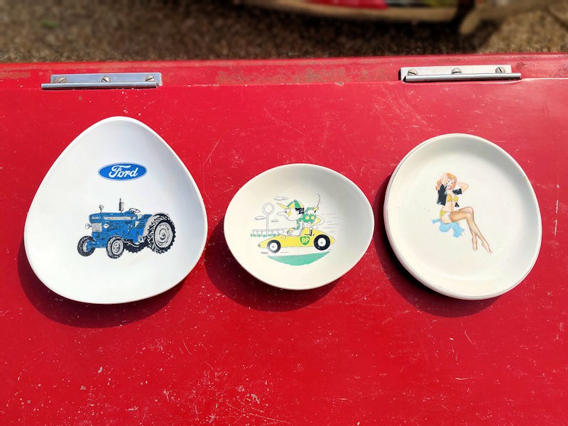 Vintage Ford BP and stockinged lady change trays
