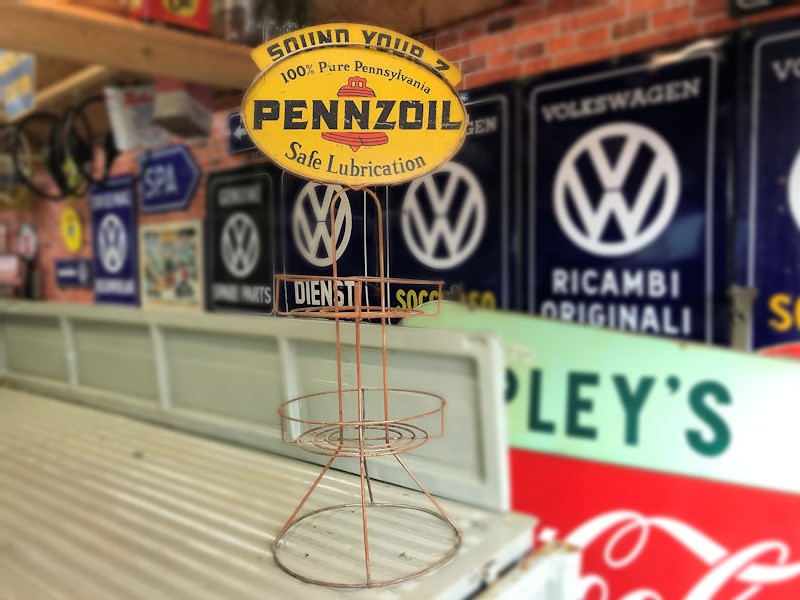 Original vintage Pennzoil oil can metal display stand