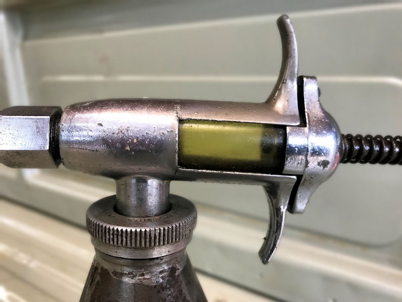 Original embossed Redex oil dispenser