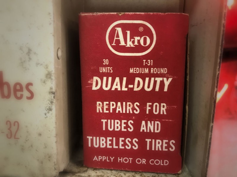 Akro by Buxbaum tire repair kit diplay cabinet and patches