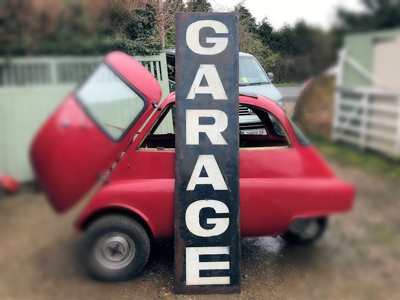 Original 1940s painted metal garage sign