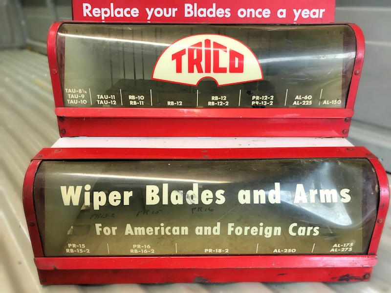 Original Trico wiper blades counter top display with two rare windshield washer cans