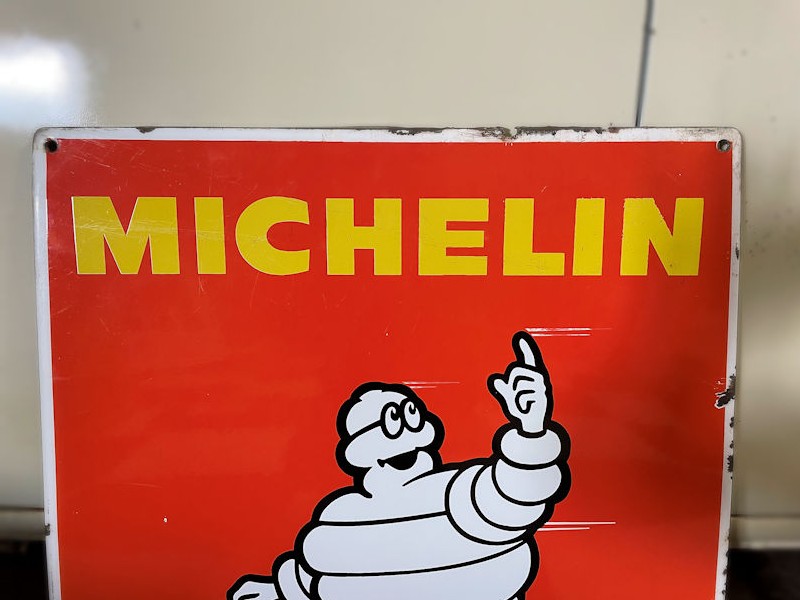 Original enamel Michelin Bibendum motor cyclist sign
