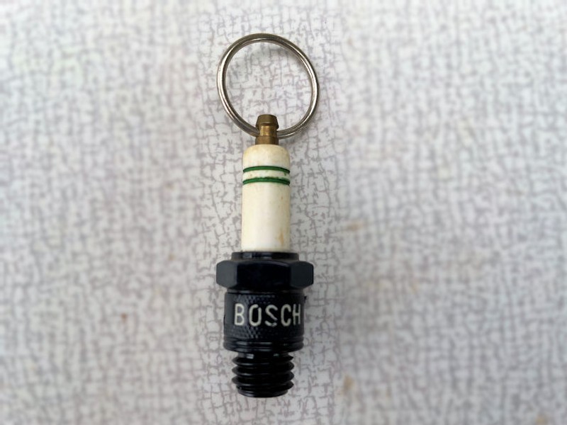 Original Esso drip Veedol girl AC and Bosch spark plug key rings