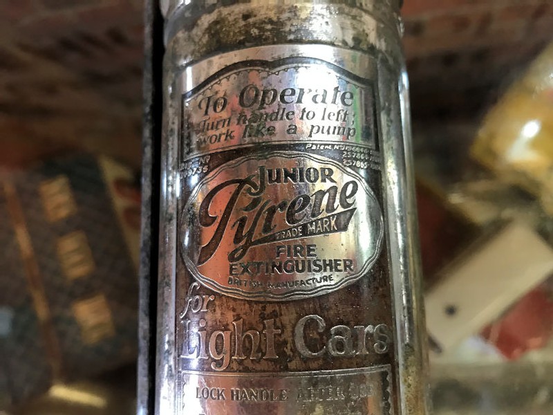 All original chrome Junior Pyrene car extinguisher and bracket
