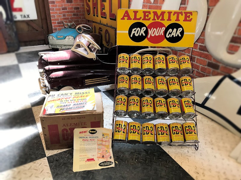 NOS 1959 Alemite display rack and tin cans