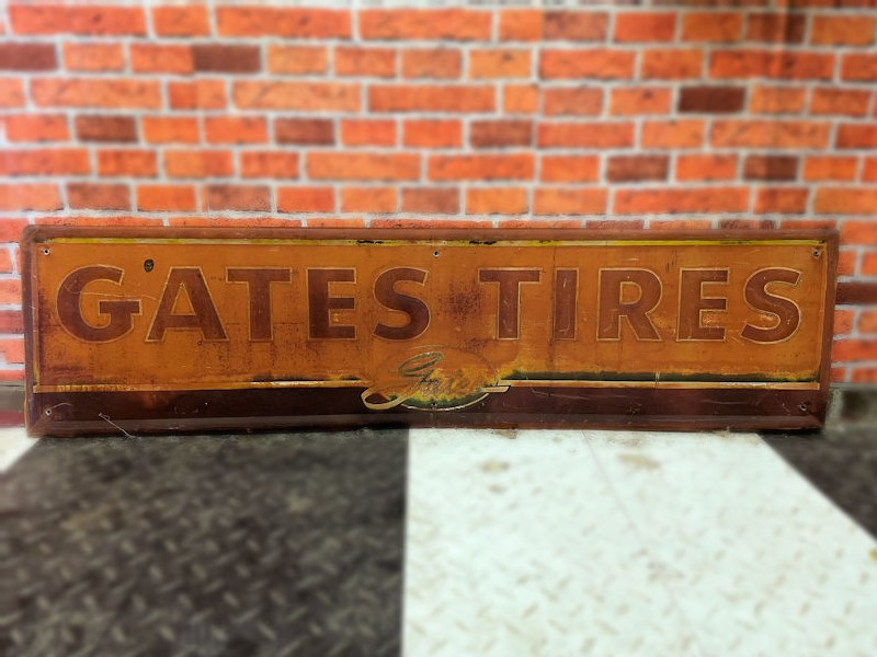 Original 1960s embossed tin Gates Tires sign