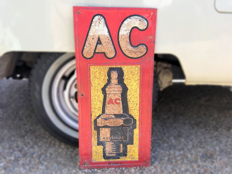 Original vintage embossed tin AC spark plug sign