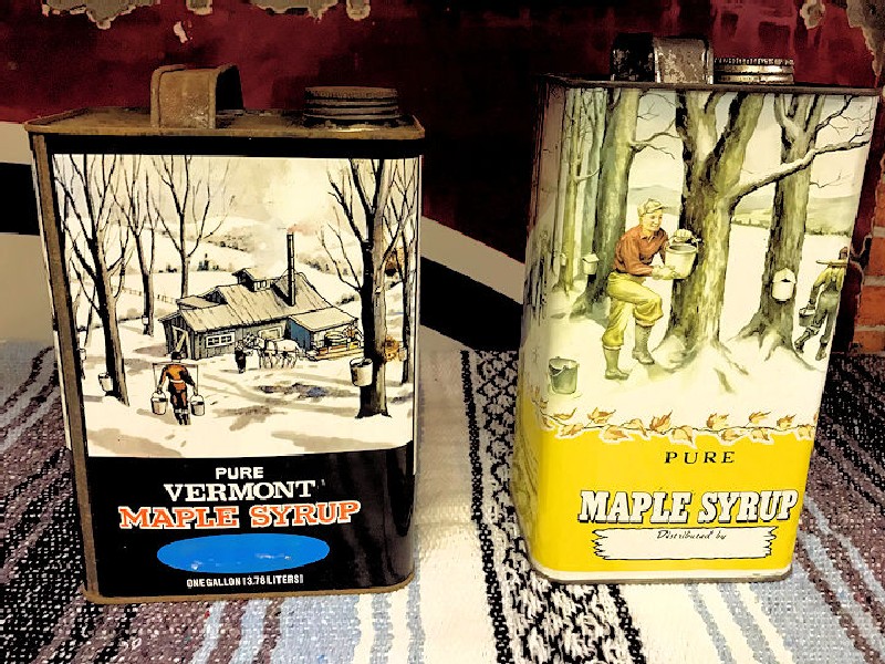 Vintage maple syrup cans