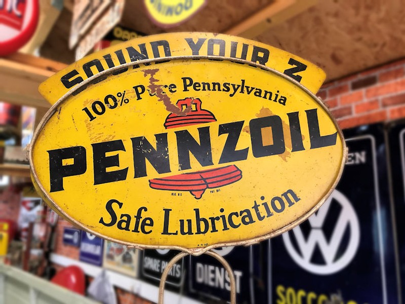 Original vintage Pennzoil oil can metal display stand