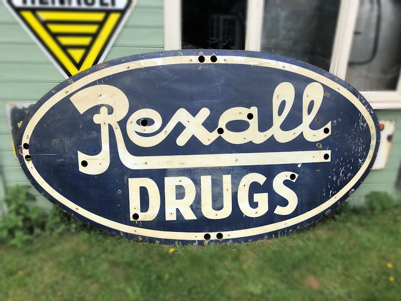 Original enamel 1950s Rexall Drugs neon sign