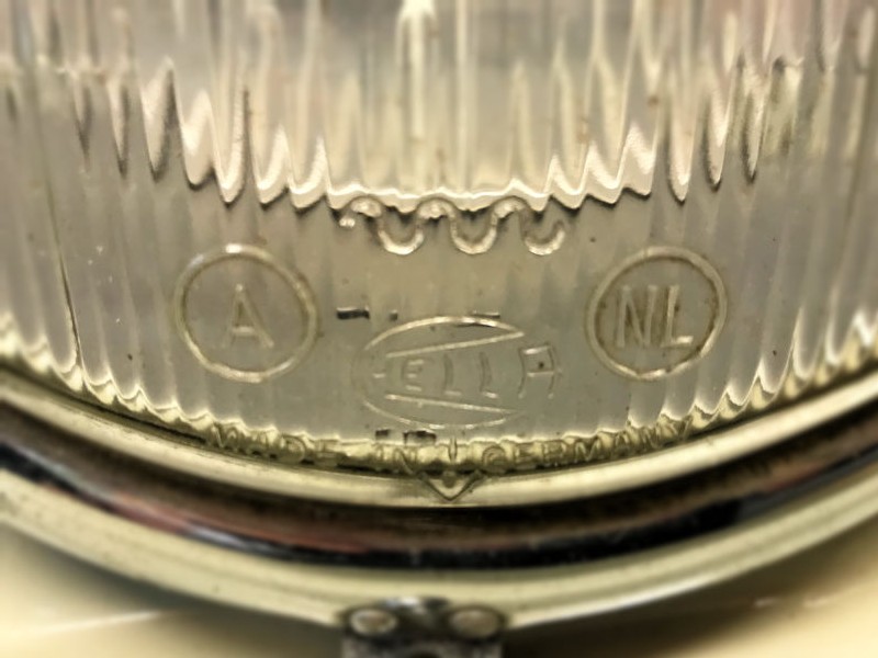 Original new old stock Oval Beetle VW logo Hella headlamps