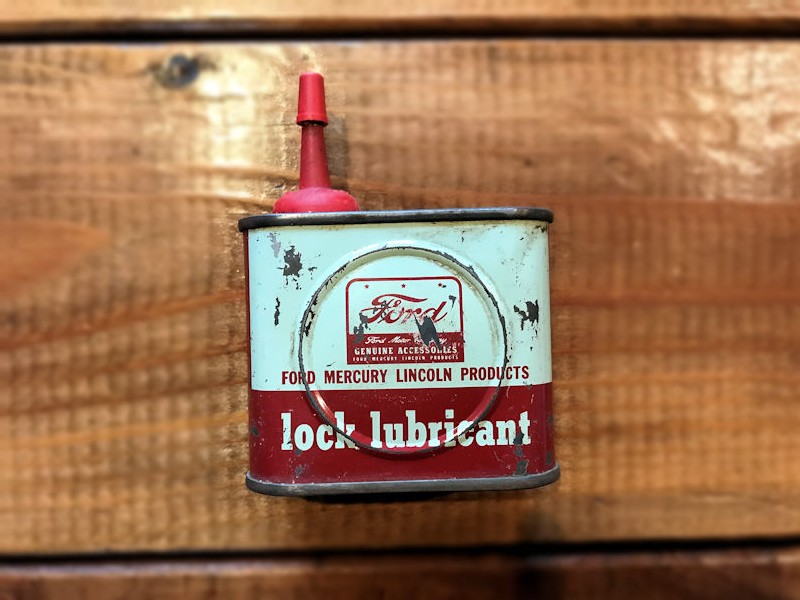 Original embossed Ford lock lubricant tin