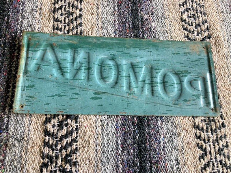 Embossed Pomona fencing co sign