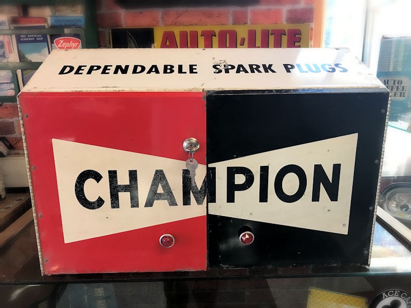 Metal Champion spark plug storage cabinet