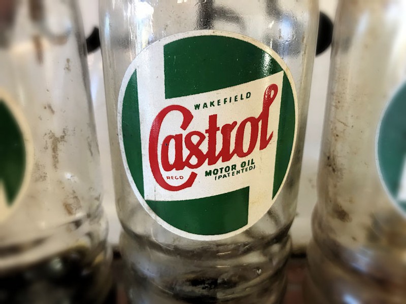 Original glass Castrol oil bottles
