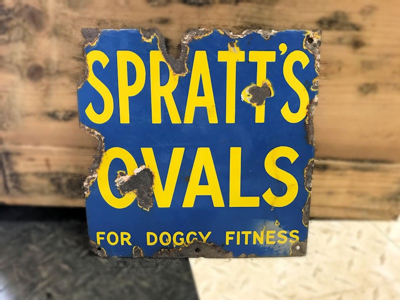 Original enamel Spratts Ovals dog food sign