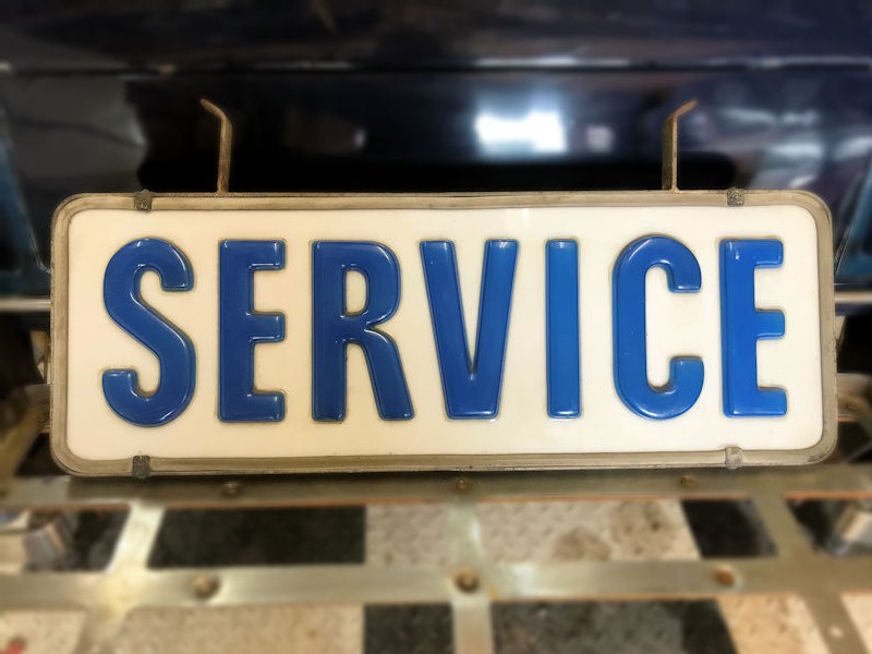 Original embossed plastic Service sign